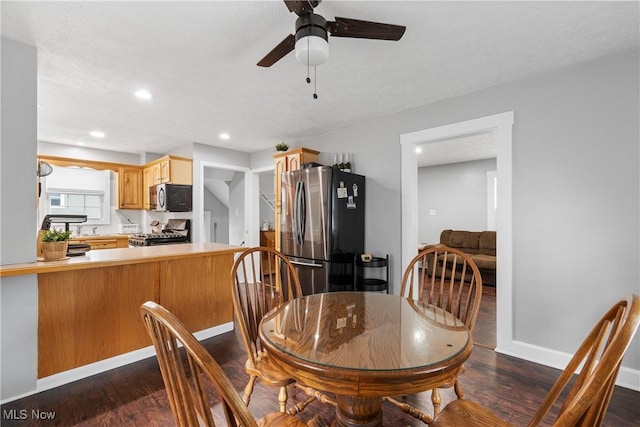 360 Woodside Ave NE, North Canton, OH 44720 - dining space featuring dark wood-style flooring, ceiling fan, baseboards, and recessed lighting