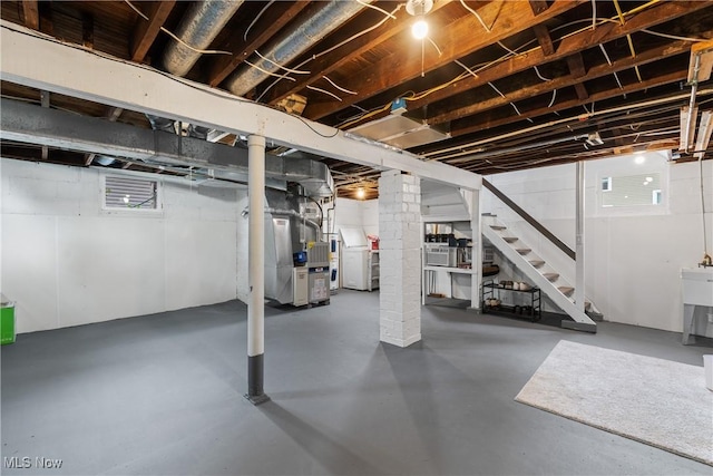 360 Woodside Ave NE, North Canton, OH 44720 - basement featuring stairs and heating unit