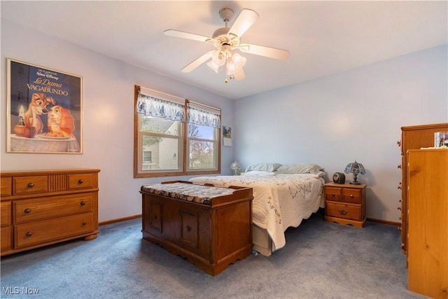 3645 Glen Eagles Blvd, Green, OH 44685 - bedroom with carpet floors, baseboards, and a ceiling fan