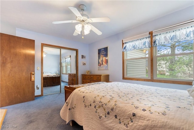 3645 Glen Eagles Blvd, Green, OH 44685 - bedroom with carpet, a closet, and a ceiling fan