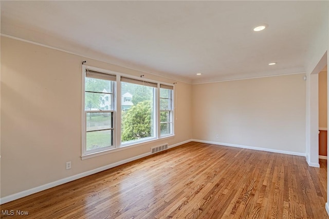 4092 Charlton Rd, South Euclid, OH 44121 - unfurnished room featuring baseboards, ornamental molding, light wood-type flooring, and recessed lighting