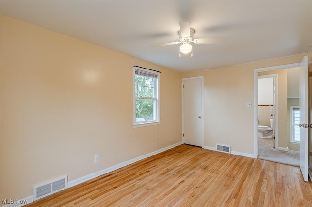 4092 Charlton Rd, South Euclid, OH 44121 - spare room with light wood-style floors, plenty of natural light, baseboards, and a ceiling fan