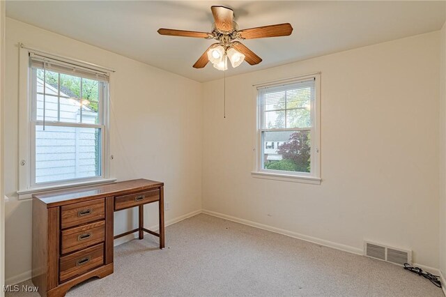 4092 Charlton Rd, South Euclid, OH 44121 - home office with healthy amount of natural light, light colored carpet, and baseboards