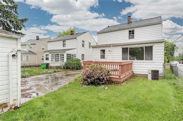 4092 Charlton Rd, South Euclid, OH 44121 - back of house with a deck, central AC unit, and a chimney