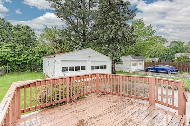 4092 Charlton Rd, South Euclid, OH 44121 - wooden deck with a detached garage and an outbuilding
