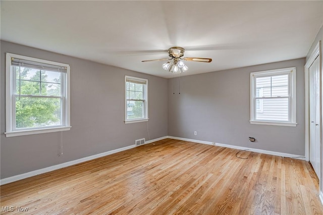 4092 Charlton Rd, South Euclid, OH 44121 - empty room featuring light wood finished floors, baseboards, and ceiling fan