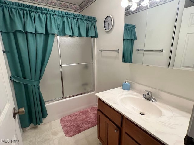 139 E Walnut St, Barnesville, OH 43713 - bathroom with vanity and shower / bath combination with glass door