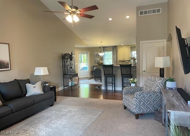 170 Sandy Ct Unit 11, New Middletown, OH 44442 - living room with high vaulted ceiling, a ceiling fan, wood finished floors, baseboards, and recessed lighting