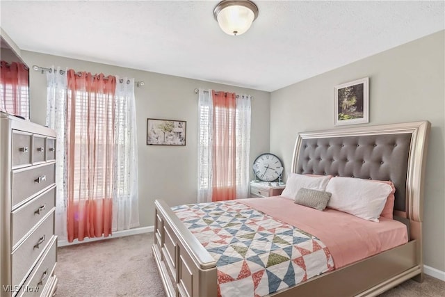 4527 Cupola Dr, Lorain, OH 44053 - bedroom featuring light colored carpet and baseboards