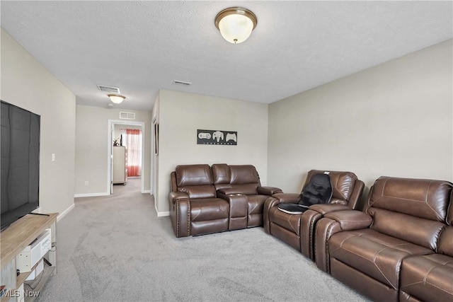 4527 Cupola Dr, Lorain, OH 44053 - living room with light colored carpet, baseboards, and a textured ceiling