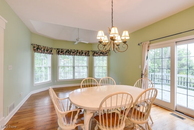 835 Thelma Dr, Wadsworth, OH 44281 - dining space with light wood-style flooring, a chandelier, and baseboards