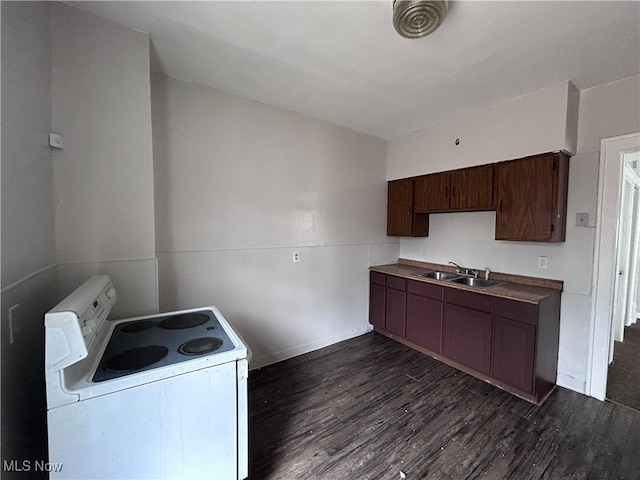 2920 E 111th St, Cleveland, OH 44104 - kitchen featuring electric stove, a sink, dark wood-style floors, baseboards, and dark brown cabinetry