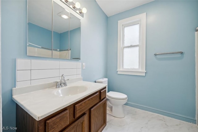 3399 E 65th St, Cleveland, OH 44127 - full bathroom featuring vanity, marble look tile flooring, toilet, and a shower with shower curtain