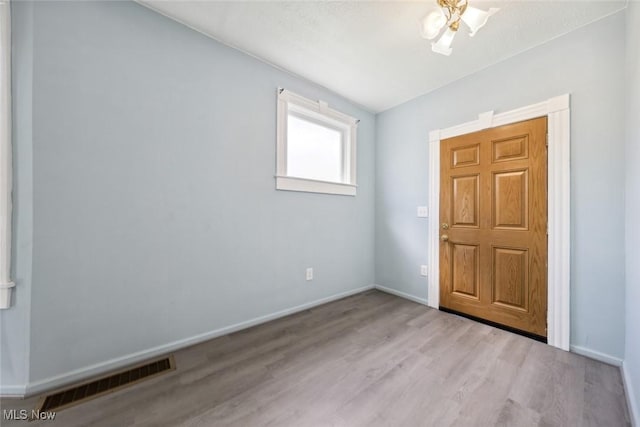 3399 E 65th St, Cleveland, OH 44127 - entryway with wood finished floors and baseboards