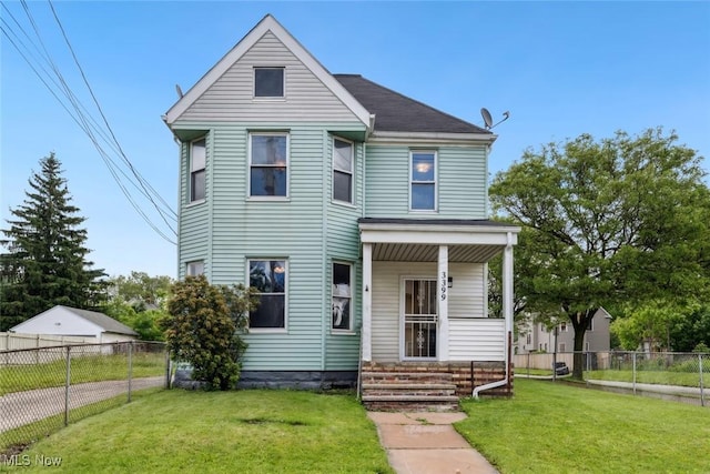 3399 E 65th St, Cleveland, OH 44127 - victorian home featuring a porch