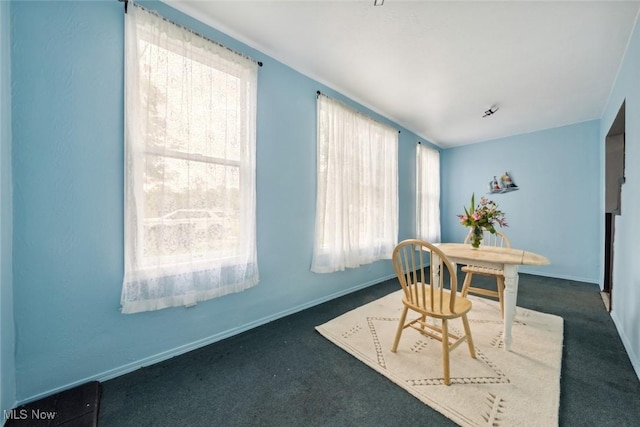 3399 E 65th St, Cleveland, OH 44127 - carpeted dining area with baseboards