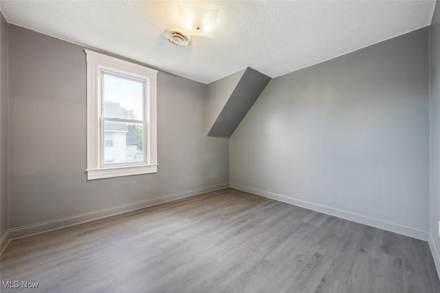 3399 E 65th St, Cleveland, OH 44127 - additional living space with wood finished floors and baseboards