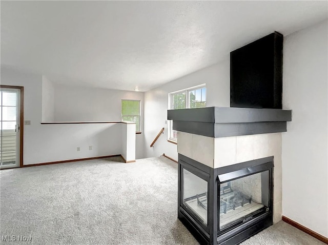 23135 Grist Mill Ct Unit 29C, Olmsted Falls, OH 44138 - unfurnished living room with carpet flooring and baseboards