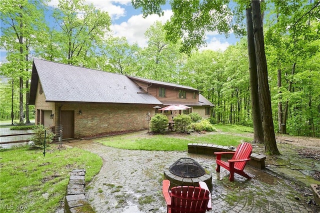 5074 Tall Timbers Dr, Richfield, OH 44286 - view of yard with an outdoor fire pit