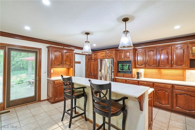 5074 Tall Timbers Dr, Richfield, OH 44286 - kitchen featuring stainless steel fridge with ice dispenser, black microwave, light countertops, an island with sink, and backsplash