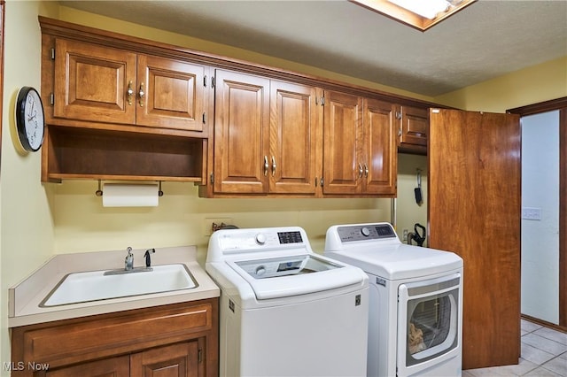 5074 Tall Timbers Dr, Richfield, OH 44286 - laundry room with independent washer and dryer, cabinet space, and light tile patterned floors