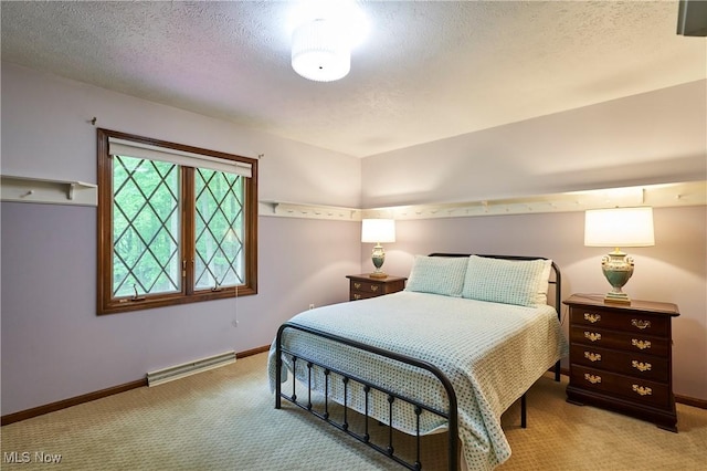 5074 Tall Timbers Dr, Richfield, OH 44286 - bedroom with light carpet, baseboard heating, baseboards, and a textured ceiling