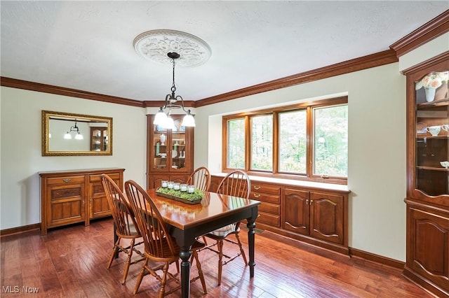 5074 Tall Timbers Dr, Richfield, OH 44286 - dining room with dark wood-style floors, ornamental molding, and baseboards