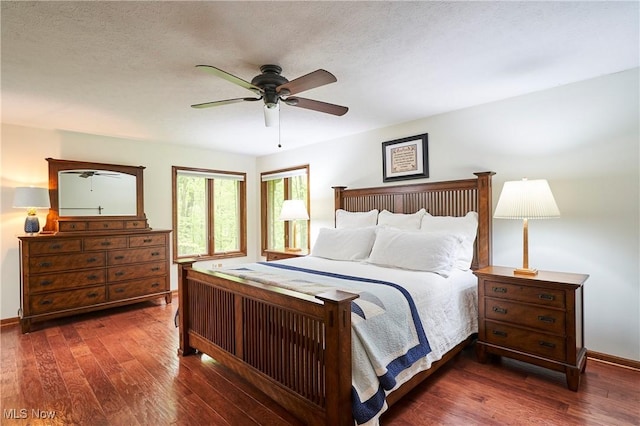 5074 Tall Timbers Dr, Richfield, OH 44286 - bedroom featuring wood finished floors, a ceiling fan, and baseboards