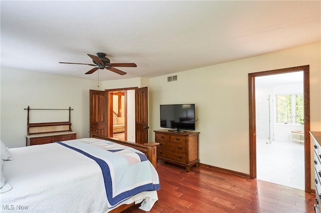 5074 Tall Timbers Dr, Richfield, OH 44286 - bedroom featuring wood finished floors, baseboards, connected bathroom, and ceiling fan