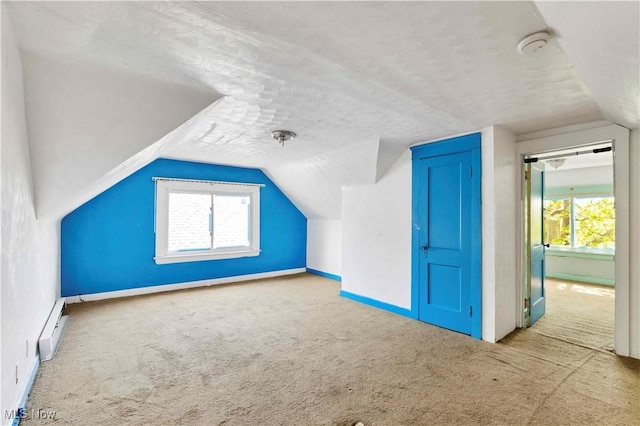 851 Paxton Rd, Cleveland, OH 44108 - bonus room with carpet flooring, lofted ceiling, healthy amount of natural light, baseboard heating, and baseboards