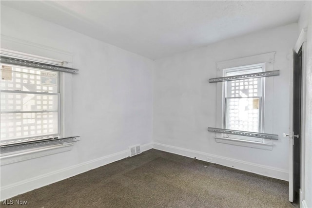 851 Paxton Rd, Cleveland, OH 44108 - spare room with carpet floors and baseboards