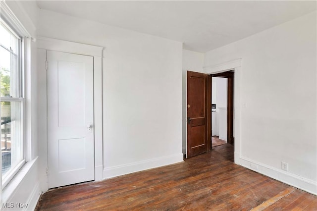 851 Paxton Rd, Cleveland, OH 44108 - empty room featuring dark wood finished floors and baseboards