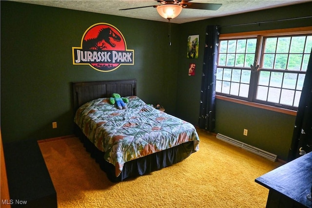 5399 N Elyria Rd, West Salem, OH 44287 - bedroom with baseboard heating, carpet floors, baseboards, a textured ceiling, and ceiling fan
