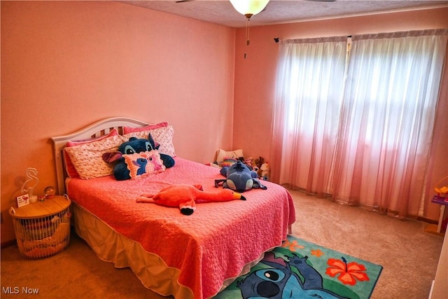 5399 N Elyria Rd, West Salem, OH 44287 - carpeted bedroom with a ceiling fan
