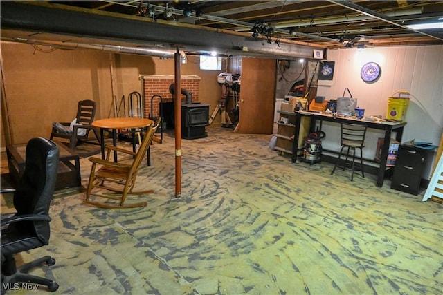 5399 N Elyria Rd, West Salem, OH 44287 - basement with a wood stove