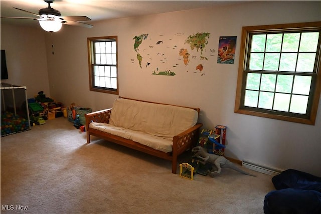 5399 N Elyria Rd, West Salem, OH 44287 - sitting room with a baseboard heating unit, carpet floors, and ceiling fan