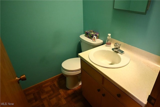 5399 N Elyria Rd, West Salem, OH 44287 - half bath featuring toilet, vanity, and baseboards