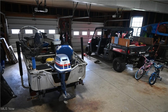 5399 N Elyria Rd, West Salem, OH 44287 - garage featuring a garage door opener