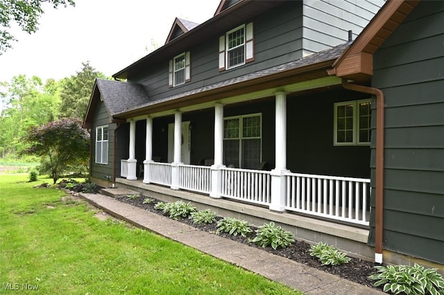 5399 N Elyria Rd, West Salem, OH 44287 - view of property exterior featuring a porch, a yard, and roof with shingles