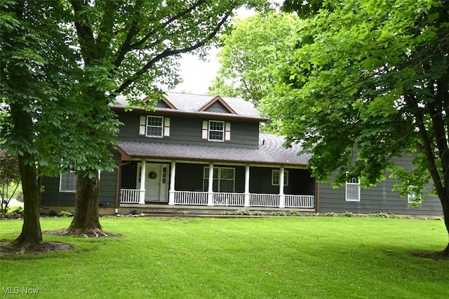 5399 N Elyria Rd, West Salem, OH 44287 - view of front of property featuring covered porch, a front lawn, and roof with shingles