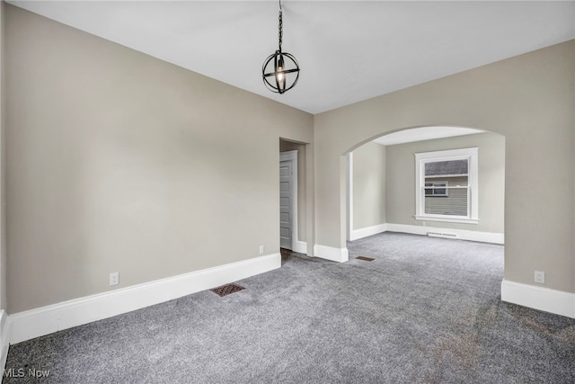 6567 S Pricetown Rd, Berlin Center, OH 44401 - carpeted spare room with arched walkways, baseboards, and a chandelier