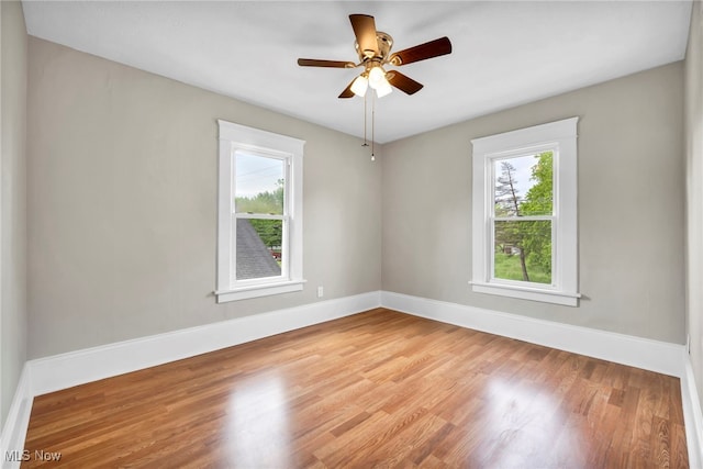 6567 S Pricetown Rd, Berlin Center, OH 44401 - spare room featuring baseboards, wood finished floors, and ceiling fan