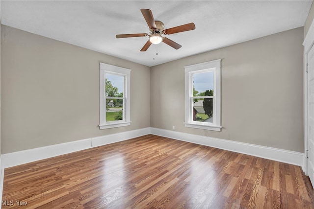 6567 S Pricetown Rd, Berlin Center, OH 44401 - spare room with plenty of natural light, baseboards, and wood finished floors
