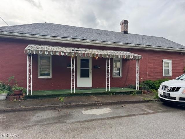 801 High St, Wellsburg, WV 26070 - view of front of property with a chimney