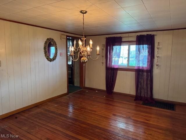 801 High St, Wellsburg, WV 26070 - unfurnished dining area featuring hardwood / wood-style flooring, a chandelier, wood walls, baseboards, and ornamental molding