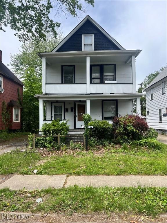 566 E 128th St, Cleveland, OH 44108 - view of front of house with a porch