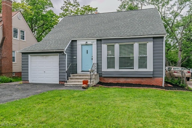 1620 S Taylor Rd, Cleveland Heights, OH 44118 - view of front facade featuring entry steps, a garage, a shingled roof, and a front lawn