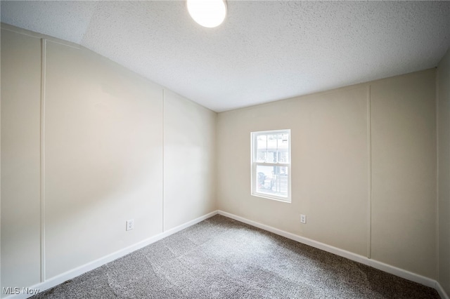 141 Marilyn Dr, Madison, OH 44057 - unfurnished room with carpet floors, a textured ceiling, and baseboards