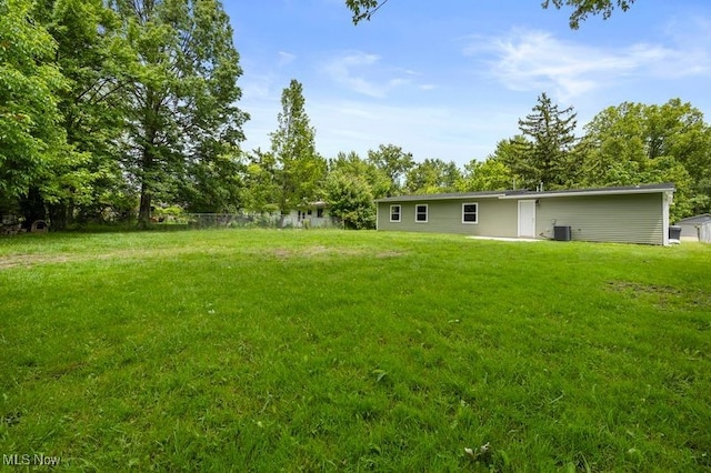 12364 Avalon Dr, Grafton, OH 44044 - view of green lawn with central air condition unit