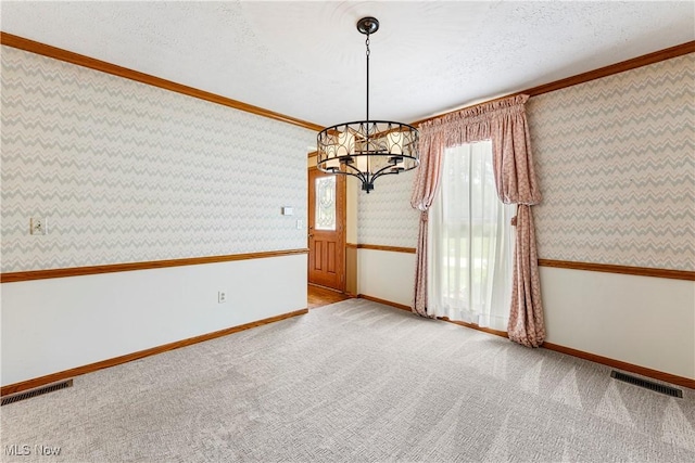 9852 Hocking St NW, Massillon, OH 44646 - unfurnished room with a chandelier, wallpapered walls, baseboards, crown molding, and carpet floors